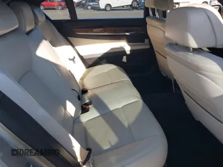 2015 BMW 7 Series 750Li with VIN WBAYE8C55FD782384, listed as a IAAI auction lot 41319363 with 75,784 mi miles. Bid and sale history available at carsss.com. Image 8.