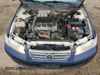 2000 Toyota Camry LE z VIN 4T1BF22KXYU953641, wystawiony jako Copart lot #48018145 z przebiegiem 118 587 mil mil oraz Czysty tytuł • Clean title. Historia ofert i sprzedaży dostępna na DreamBid. Obrazek 11.