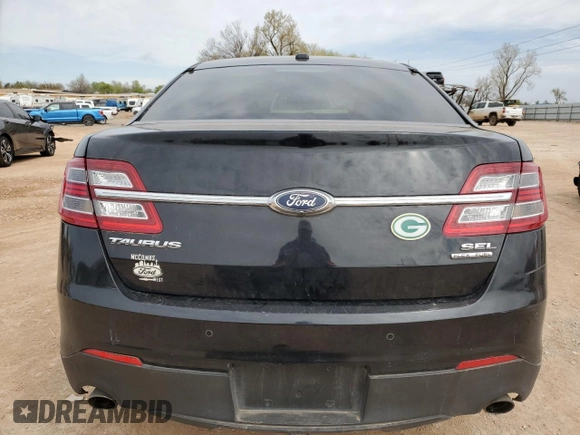 2016 Ford Taurus SEL with VIN 1FAHP2E84GG141220, listed as a Copart auction lot 48048514 with 124,631 mi miles and Salvage Title. Bid and sale history available at DreamBid. Image 6.