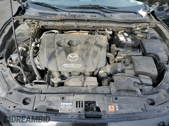 2014 Mazda 3 i Touring z VIN JM1BM1V7XE1122326, wystawiony jako Copart lot #86185154 z przebiegiem 100 067 mil mil oraz Szkoda całkowita • Salvage title. Historia ofert i sprzedaży dostępna na DreamBid. Obrazek 11.