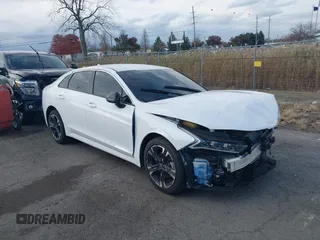 2024 Kia K5 GT-Line z VIN 5XXG64J29RG259036, wystawiony jako IAAI lot #40777274 z przebiegiem 6716 mil mil oraz . Historia ofert i sprzedaży dostępna na DreamBid. Obrazek 1.