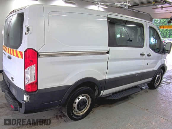 2019 Ford Transit with VIN 1FTYE1YM0KKB31938, listed as a IAAI auction lot 42667322 with 196,239 mi miles and . Bid and sale history available at DreamBid. Image 15.