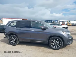 2022 Honda Pilot Elite with VIN 5FNYF6H04NB025212, listed as a IAAI auction lot 42430032 with 69,427 mi miles and . Bid and sale history available at DreamBid. Image 13.
