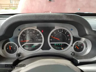 2008 Jeep Wrangler Sahara with VIN 1J4FA54118L537472, listed as a Copart auction lot 57785185 with 121,029 mi miles and Clean title. Bid and sale history available at DreamBid. Image 8.
