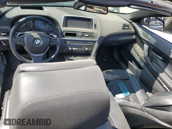 2012 BMW 6 Series 650i z VIN WBALZ3C55CDL70172, wystawiony jako Copart lot #58656785 z przebiegiem 104 657 mil mil oraz Czysty tytuł • Clean title. Historia ofert i sprzedaży dostępna na DreamBid. Obrazek 8.