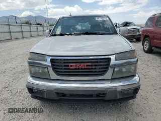 2011 GMC Canyon z VIN 1GTJ6NFE2B8106697, wystawiony jako Copart lot #60759215 z przebiegiem 135 912 mil mil oraz Czysty tytuł • Clean title. Historia ofert i sprzedaży dostępna na DreamBid. Obrazek 5.