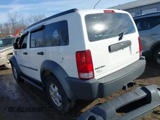 2008 Dodge Nitro SXT with VIN 1D8GU28K18W113714, listed as a IAAI auction lot 41671938 with 118,629 mi miles. Bid and sale history available at carsss.com. Image 3.
