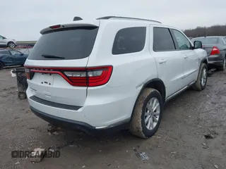 2015 Dodge Durango SXT with VIN 1C4RDJAG4FC760713, listed as a IAAI auction lot 41707354 with 174,216 mi miles and . Bid and sale history available at carsss.com. Image 4.