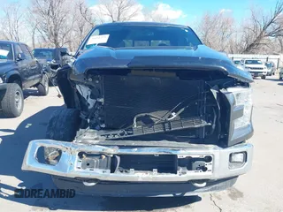 2015 Ford F-150 XLT with VIN 1FTEW1EG4FFC84691, listed as a IAAI auction lot 41651229 with 144,784 mi miles. Bid and sale history available at carsss.com. Image 13.
