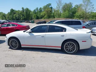 2014 Dodge Charger SE with VIN 2C3CDXBG2EH258886, listed as a IAAI auction lot 42104999 with 185,723 mi miles. Bid and sale history available at carsss.com. Image 14.