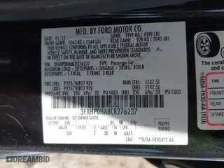 2012 Ford Fusion SE with VIN 3FAHP0HA8CR276237, listed as a IAAI auction lot 42048715 with 1,799,668 mi miles. Bid and sale history available at carsss.com. Image 9.