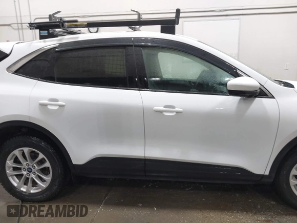 2020 Ford Escape SE z VIN 1FMCU9G62LUB80302, wystawiony jako IAAI lot #42610731 z przebiegiem 43 873 mil mil oraz . Historia ofert i sprzedaży dostępna na DreamBid. Obrazek 13.