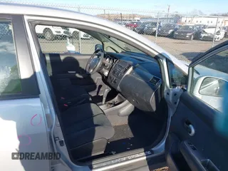 2012 Nissan Versa S with VIN 3N1BC1CP2CK213563, listed as a IAAI auction lot 41339306 with 61,581 mi miles. Bid and sale history available at carsss.com. Image 5.