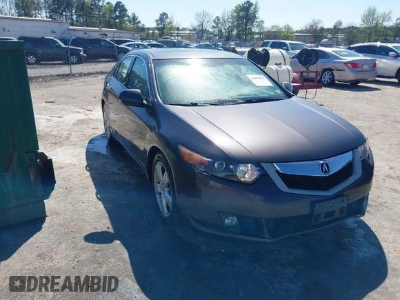 2010 Acura TSX with VIN JH4CU2F63AC003630, listed as a IAAI auction lot 42002216 with 131,244 mi miles. Bid and sale history available at carsss.com. Image 1.