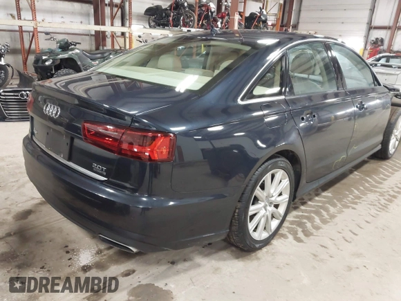 2016 Audi A6 2.0T Premium Plus with VIN WAUGFAFC4GN052293, listed as a IAAI auction lot 41683195 with 85,312 mi miles. Bid and sale history available at carsss.com. Image 4.