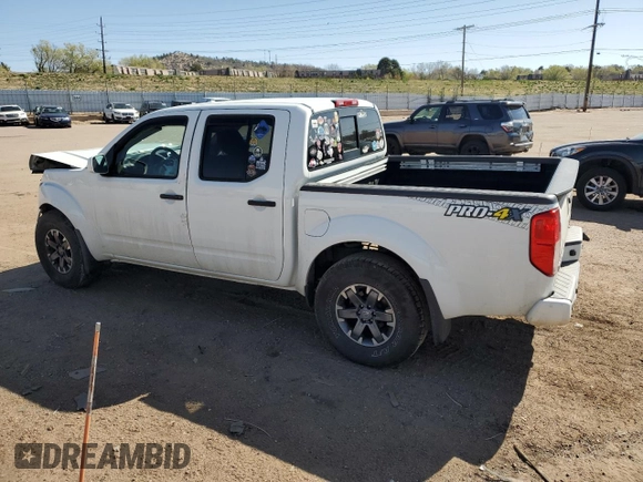 2018 Nissan Frontier Pro-4X with VIN 1N6AD0EV1JN715111, listed as a Copart auction lot 54012255 with 127,409 mi miles and Salvage title. Bid and sale history available at DreamBid. Image 2.