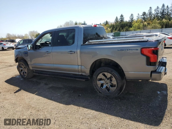 2024 Ford F-150 Lightning Flash with VIN 1FT6W3L74RWG04714, listed as a Copart auction lot 56320265 with 13,454 mi miles and Salvage title. Bid and sale history available at DreamBid. Image 2.