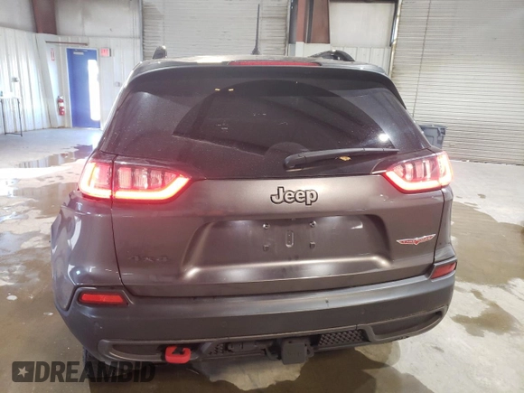 2022 Jeep Cherokee Trailhawk with VIN 1C4PJMBX8ND500503, listed as a Copart auction lot 85705204 with 31,112 mi miles and Salvage Title. Bid and sale history available at DreamBid. Image 6.