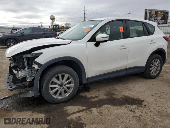 2015 Mazda CX-5 Sport z VIN JM3KE4BY2F0516574, wystawiony jako Copart lot #84100544 z przebiegiem Nie podano mil oraz Szkoda całkowita • Salvage title. Historia ofert i sprzedaży dostępna na DreamBid. Obrazek 1.