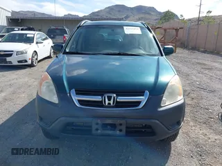 2004 Honda CR-V EX with VIN JHLRD78844C021536, listed as a IAAI auction lot 42163410 with 300,865 mi miles and . Bid and sale history available at carsss.com. Image 6.