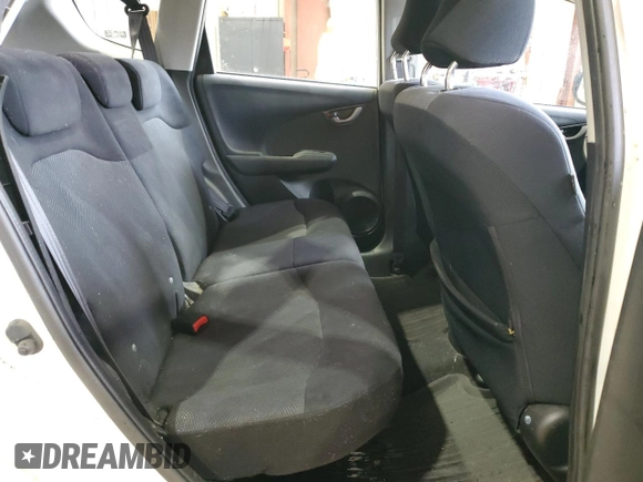 2009 Honda Fit Sport with VIN JHMGE88419S026712, listed as a Copart auction lot 51165865 with 54,586 mi miles and Salvage Title. Bid and sale history available at carsss.com. Image 10.