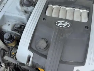 2004 Hyundai XG с VIN KMHFU45E74A326240, выставлен на аукционе Copart как лот 66140995 с пробегом 158 482 миль миль и Чистый • Clean title. История ставок и продаж доступна на DreamBid. Изображение 13.