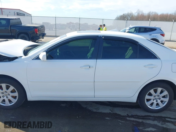 2009 Toyota Camry LE with VIN 4T1BK46K89U582997, listed as a IAAI auction lot 41800164 with 243,922 mi miles. Bid and sale history available at carsss.com. Image 14.