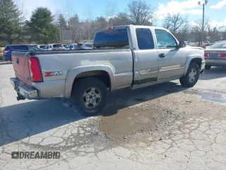 2003 Chevrolet Silverado 1500 LS with VIN 2GCEK19V231240843, listed as a IAAI auction lot 41439844 with 351,433 mi miles. Bid and sale history available at carsss.com. Image 4.