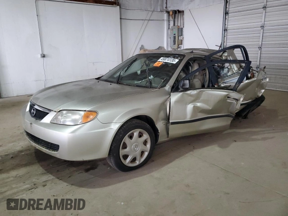 2002 Mazda Protege DX with VIN JM1BJ225021583998, listed as a Copart auction lot 49874135 with Not Provided miles and Non Repairable. Bid and sale history available at DreamBid. Image 1.