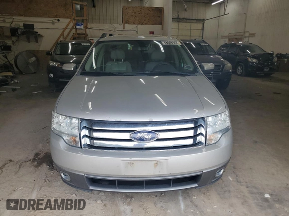 2008 Ford Taurus X SEL с VIN 1FMDK05W88GA38972, выставлен на аукционе Copart как лот 58008955 с пробегом 152 696 миль миль и Списание • Salvage title. История ставок и продаж доступна на DreamBid. Изображение 5.
