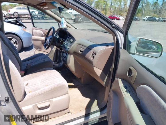 2001 Toyota Sienna LE with VIN 4T3ZF13CX1U372072, listed as a IAAI auction lot 41889291 with 228,959 mi miles. Bid and sale history available at carsss.com. Image 5.