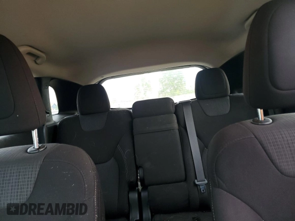 2016 Jeep Cherokee Latitude z VIN 1C4PJLCB9GW303148, wystawiony jako Copart lot #59392805 z przebiegiem 123 015 mil mil oraz Szkoda całkowita • Salvage title. Historia ofert i sprzedaży dostępna na DreamBid. Obrazek 10.