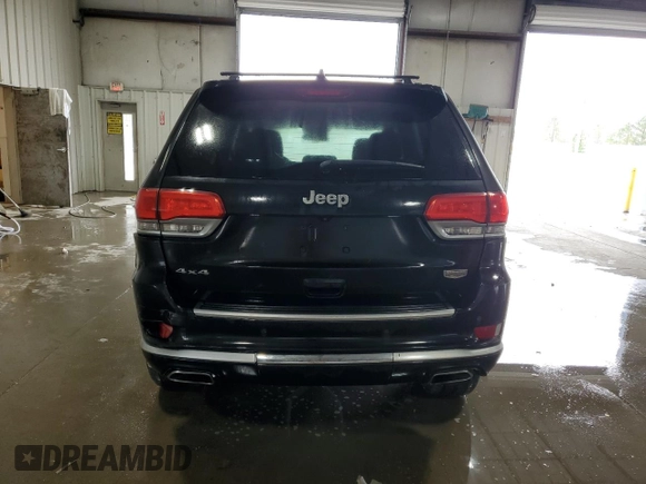 2015 Jeep Grand Cherokee Summit with VIN 1C4RJFJG0FC685241, listed as a Copart auction lot 56122505 with 112,516 mi miles and Salvage title. Bid and sale history available at DreamBid. Image 6.