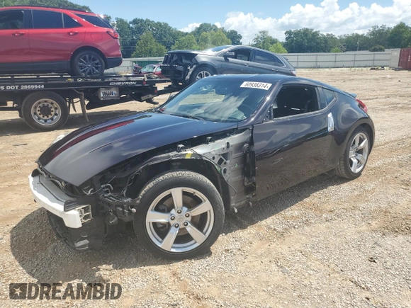 2012 Nissan 370Z Touring with VIN JN1AZ4EH9CM561796, listed as a Copart auction lot 60938314 with 59,011 mi miles and Salvage Title. Bid and sale history available at carsss.com. Image 1.