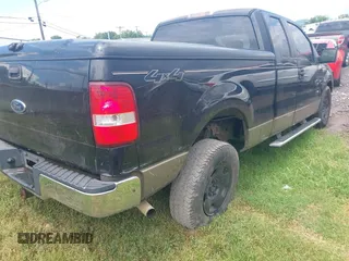 2005 Ford F-150 STX with VIN 1FTRX14W75NA08355, listed as a IAAI auction lot 42634298 with 229,704 mi miles and . Bid and sale history available at DreamBid. Image 4.