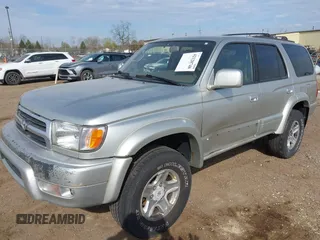 1999 Toyota 4Runner Limited z VIN JT3HN87R0X9024980, wystawiony jako IAAI lot #42128748 z przebiegiem 290 613 mil mil oraz . Historia ofert i sprzedaży dostępna na DreamBid. Obrazek 2.