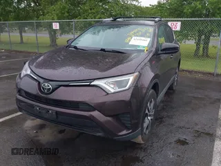 2018 Toyota RAV4 LE with VIN 2T3BFREV9JW857284, listed as a IAAI auction lot 42448480 with 85,551 mi miles and . Bid and sale history available at DreamBid. Image 2.