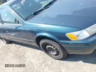 1997 Toyota Camry LE with VIN JT2BG22K5V0073783, listed as a IAAI auction lot 42409561 with 149,560 mi miles and . Bid and sale history available at DreamBid. Image 6.