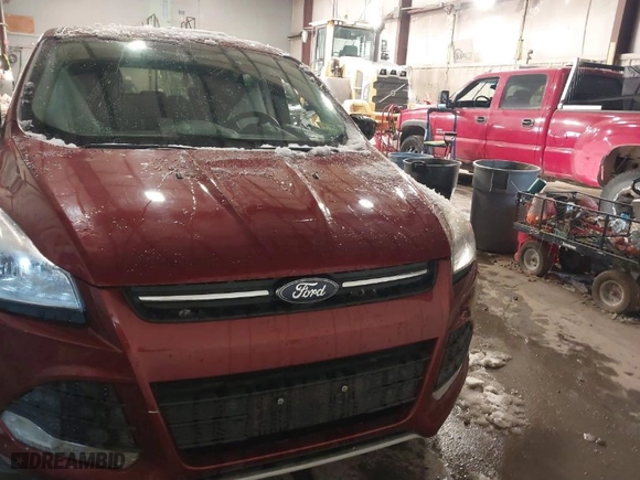2014 Ford Escape SE with VIN 1FMCU9GX7EUA33937, listed as a IAAI auction lot 41504576 with 104,908 mi miles. Bid and sale history available at carsss.com. Image 12.