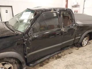 2001 Toyota Tundra SR5 with VIN 5TBRT34131S169696, listed as a IAAI auction lot 41481456 with 215,679 mi miles and . Bid and sale history available at DreamBid. Image 6.