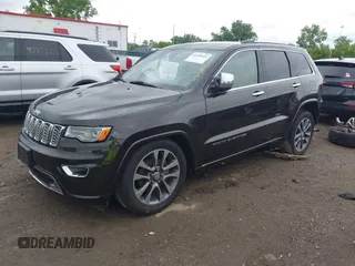 2017 Jeep Grand Cherokee Overland z VIN 1C4RJFCG7HC800403, wystawiony jako IAAI lot #42309664 z przebiegiem 98 389 mil mil oraz . Historia ofert i sprzedaży dostępna na DreamBid. Obrazek 2.