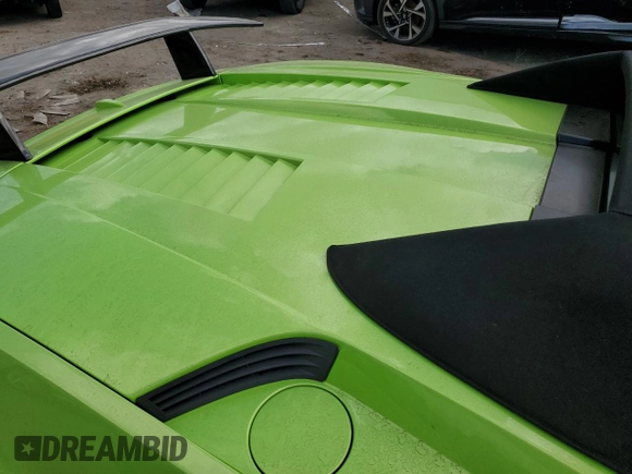 2013 Lamborghini Gallardo z VIN ZHWGU6BZ9DLA12793, wystawiony jako Copart lot #77525804 z przebiegiem 11 777 mil mil oraz Szkody całkowita. Historia ofert i sprzedaży dostępna na DreamBid. Obrazek 10.