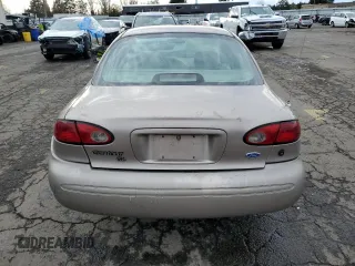 1996 Ford Contour с VIN 3FALP6535TM129390, выставлен на аукционе Copart как лот 73338064 с пробегом 87 588 миль миль и Списание • Salvage title. История ставок и продаж доступна на DreamBid. Изображение 6.
