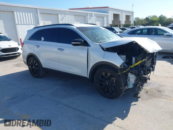 2020 Kia Sorento LX V6 with VIN 5XYPG4A56LG655600, listed as a IAAI auction lot 41971459 with 66,449 mi miles. Bid and sale history available at carsss.com. Image 1.