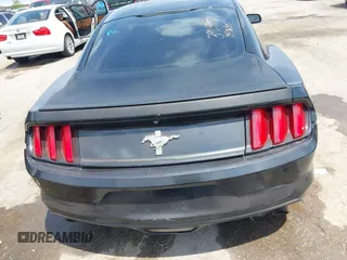 2015 Ford Mustang V6 with VIN 1FA6P8AM3F5392995, listed as a IAAI auction lot 42063188 with 128,854 mi miles and . Bid and sale history available at DreamBid. Image 16.