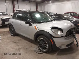 2015 MINI Countryman with VIN WMWZB3C59FWR46546, listed as a IAAI auction lot 41687489 with 95,734 mi miles and . Bid and sale history available at DreamBid. Image 1.