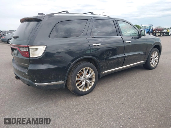 2014 Dodge Durango Citadel with VIN 1C4SDJET5EC314304, listed as a IAAI auction lot 42682540 with 213,651 mi miles and . Bid and sale history available at DreamBid. Image 4.