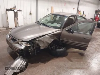 2002 Pontiac Grand Am SE1 z VIN 1G2NF52FX2C128240, wystawiony jako IAAI lot #41356415 z przebiegiem 15 900 mil mil oraz . Historia ofert i sprzedaży dostępna na DreamBid. Obrazek 17.