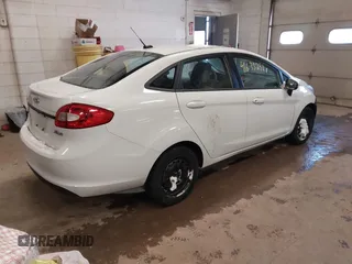 2012 Ford Fiesta S with VIN 3FADP4AJ9CM140647, listed as a IAAI auction lot 41633251 with 117,309 mi miles. Bid and sale history available at carsss.com. Image 4.