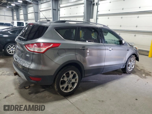 2014 Ford Escape SE with VIN 1FMCU9G96EUE53240, listed as a Copart auction lot 51920455 with 180,948 mi miles and Salvage Title. Bid and sale history available at DreamBid. Image 3.